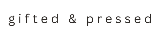 Text 'gifted & pressed' on a white background
